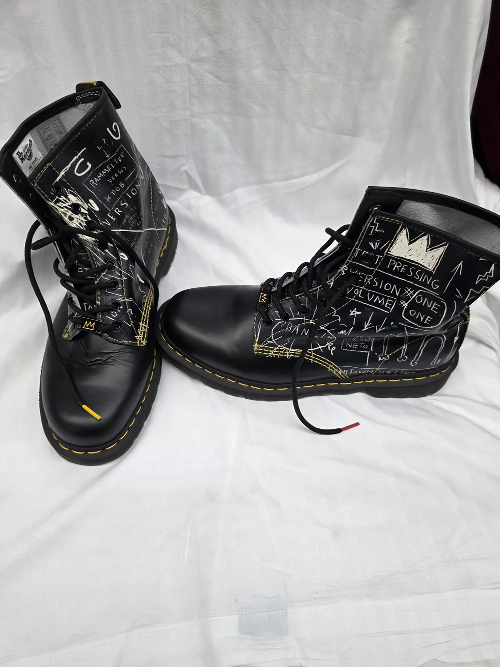 Dr. Martens Black Graffiti Lace-Up Boots with Yellow Stitching - Picture 1 of 8